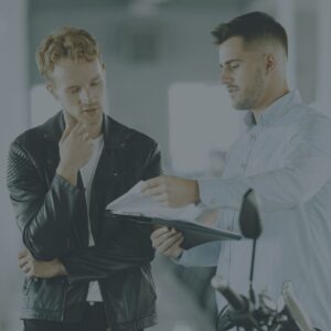 A split-screen or conceptual visual showing a massive warehouse filled with unsold clothing racks (representing retail) transitioning into a sleek, high-tech digital printing facility (representing POD).